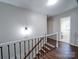 Upstairs hall with stairs and access to bathroom at 4440 Beechaven Dr, Rock Hill, SC 29732