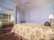 Bedroom with mirrored closet and floral bedding at 523 W 2Nd Ave, Gastonia, NC 28052