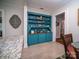 Charming teal built-in hutch with glass-front doors at 523 W 2Nd Ave, Gastonia, NC 28052