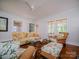 Living room with hardwood floors, ample natural light, and seating at 523 W 2Nd Ave, Gastonia, NC 28052