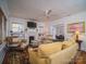 Living room features fireplace, built-ins, and hardwood floors at 523 W 2Nd Ave, Gastonia, NC 28052