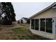 Spacious backyard with a wooden fence and sunroom at 5375 Josephine Sw Ln, Concord, NC 28027