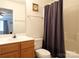 Simple bathroom with shower and wood vanity at 5375 Josephine Sw Ln, Concord, NC 28027