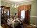 Formal dining room featuring a wood table and chairs at 5375 Josephine Sw Ln, Concord, NC 28027