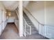 Interior view showing carpeted stairs and hallway with neutral color palette at 5435 Village Nw Dr, Concord, NC 28027