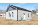 Side view of the house showcasing a modern design and small patio at 602 York Ave, Statesville, NC 28677