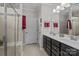 Bathroom features double vanity, modern fixtures, and a walk-in shower with tiled walls at 645 Honey Dew Ln, Fort Mill, SC 29715