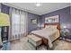 Bedroom with a queen bed, hardwood flooring and a sunny window at 645 Honey Dew Ln, Fort Mill, SC 29715