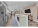 Well-lit kitchen with a central island, modern appliances, ample counter space, and seamless flow to the living area at 645 Honey Dew Ln, Fort Mill, SC 29715