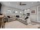 Cozy living room with a large sectional sofa and a neutral rug at 645 Honey Dew Ln, Fort Mill, SC 29715