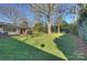 Expansive backyard with mature trees and plenty of green space at 6511 Newhall Rd, Charlotte, NC 28270