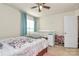 Bedroom with crib and floral bedding at 6908 Agava Ln, Charlotte, NC 28215