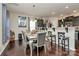 Dining area with hardwood floors and a table for six at 6908 Agava Ln, Charlotte, NC 28215