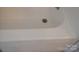 Clean bathtub and shower combination at 74 Noble Cir, Wadesboro, NC 28170