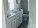 Double vanity bathroom with toilet and shower at 74 Noble Cir, Wadesboro, NC 28170