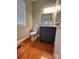 Updated powder room with a modern vanity and wood floors at 7925 Tottenham Dr, Harrisburg, NC 28075