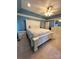 Primary bedroom featuring a large bed and plenty of closet space at 7925 Tottenham Dr, Harrisburg, NC 28075