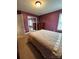 Serene bedroom with mirrored closet doors and neutral tones at 7925 Tottenham Dr, Harrisburg, NC 28075