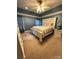 Bright bedroom with a large bed and neutral decor at 7925 Tottenham Dr, Harrisburg, NC 28075