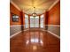 Bright dining room with hardwood floors and bay windows at 7925 Tottenham Dr, Harrisburg, NC 28075