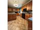 Spacious kitchen with oak cabinets and granite countertops at 7925 Tottenham Dr, Harrisburg, NC 28075