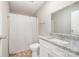 Clean bathroom, shower/tub combo, granite countertop, and white vanity at 820 Bethesda Rd, Statesville, NC 28677