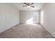 Bright bedroom with carpet flooring and ceiling fan at 820 Bethesda Rd, Statesville, NC 28677