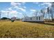 Manufactured home with a large backyard and open field at 820 Bethesda Rd, Statesville, NC 28677