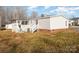 Mobile home exterior with covered porch and steps at 820 Bethesda Rd, Statesville, NC 28677