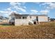 Mobile home exterior view with covered porch and yard at 820 Bethesda Rd, Statesville, NC 28677