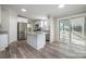 Kitchen with island, stainless steel appliances, and granite countertops at 820 Bethesda Rd, Statesville, NC 28677