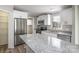 Kitchen features stainless steel appliances and granite countertops at 820 Bethesda Rd, Statesville, NC 28677