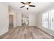 Spacious living room with vinyl flooring and ceiling fan at 820 Bethesda Rd, Statesville, NC 28677