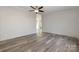 Open living area with vinyl flooring and neutral walls at 820 Bethesda Rd, Statesville, NC 28677