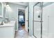 Bathroom with shower and access to bedroom at 8927 Bryant Field Cir, Charlotte, NC 28277