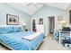 Cozy bedroom with light blue walls and built-in closet organizers at 8927 Bryant Field Cir, Charlotte, NC 28277