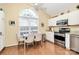 Bright kitchen with stainless steel appliances and granite countertops at 8927 Bryant Field Cir, Charlotte, NC 28277