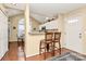 Kitchen with breakfast bar and access to dining area at 8927 Bryant Field Cir, Charlotte, NC 28277