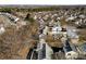 Aerial view of a neighborhood with houses and trees at 9112 Meadowmont View Dr, Charlotte, NC 28269