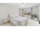 Bedroom with a queen bed and a nightstand, offering ample space at 9112 Meadowmont View Dr, Charlotte, NC 28269