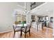 Bright dining area with a round table and chairs, near kitchen at 9112 Meadowmont View Dr, Charlotte, NC 28269