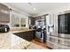 Modern kitchen featuring stainless steel appliances and granite countertops at 9112 Meadowmont View Dr, Charlotte, NC 28269