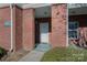 Building entrance with brick facade and a walkway at 9261 Meadow Vista Rd, Charlotte, NC 28213