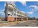 Brick multi-Gathering building with stairs and landscaping at 9261 Meadow Vista Rd, Charlotte, NC 28213