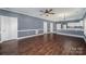 Large living room with hardwood floors and access to kitchen at 9261 Meadow Vista Rd, Charlotte, NC 28213