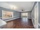 Spacious living area with hardwood floors and patio access at 9261 Meadow Vista Rd, Charlotte, NC 28213