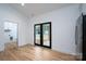 Bright dining area with hardwood floors and French doors at Lot 1 Hoke W St, Landis, NC 28088