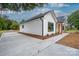 White sided home with concrete driveway and landscaping at Lot 1 Hoke W St, Landis, NC 28088