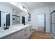 Modern bathroom with white cabinets, double vanity, and walk-in shower at Lot 1 Sloop St, China Grove, NC 28023