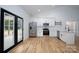 Modern kitchen with white shaker cabinets, stainless steel appliances, and white subway tile at Lot 1 Sloop St, China Grove, NC 28023